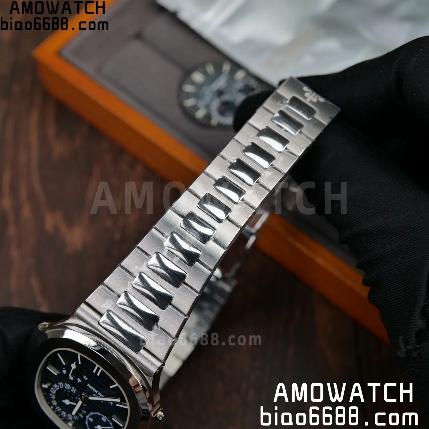 Custom Made Patek Philippe Nautilus 5712 SS UMI 118 75c405e3b3d4a58 AMO Watch