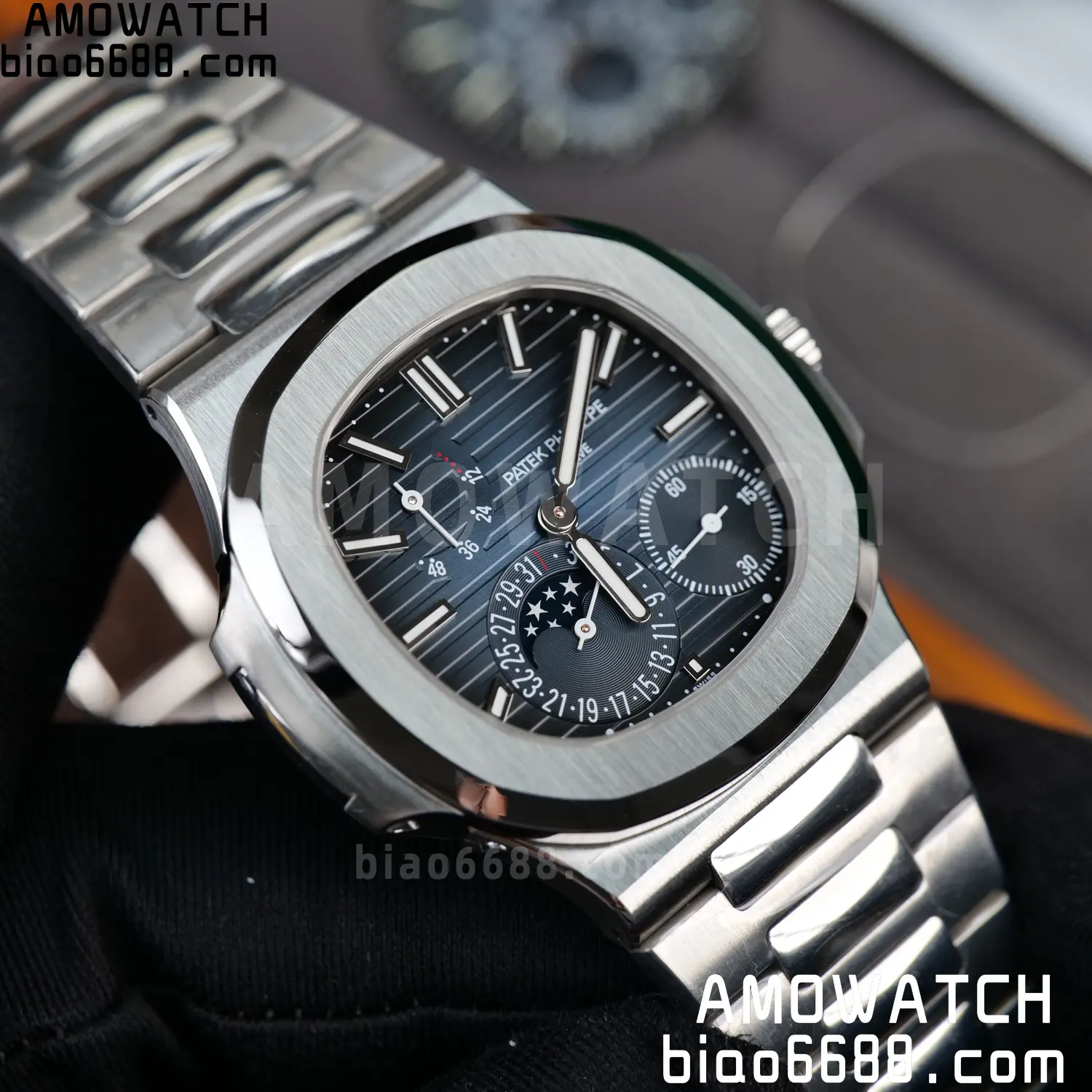 Custom Made Patek Philippe Nautilus 5712 SS UMI 127 a27fdd782941652 AMO Watch